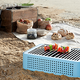 Illustration for article titled This Is Definitely the Classiest Portable Barbecue You'll Ever See